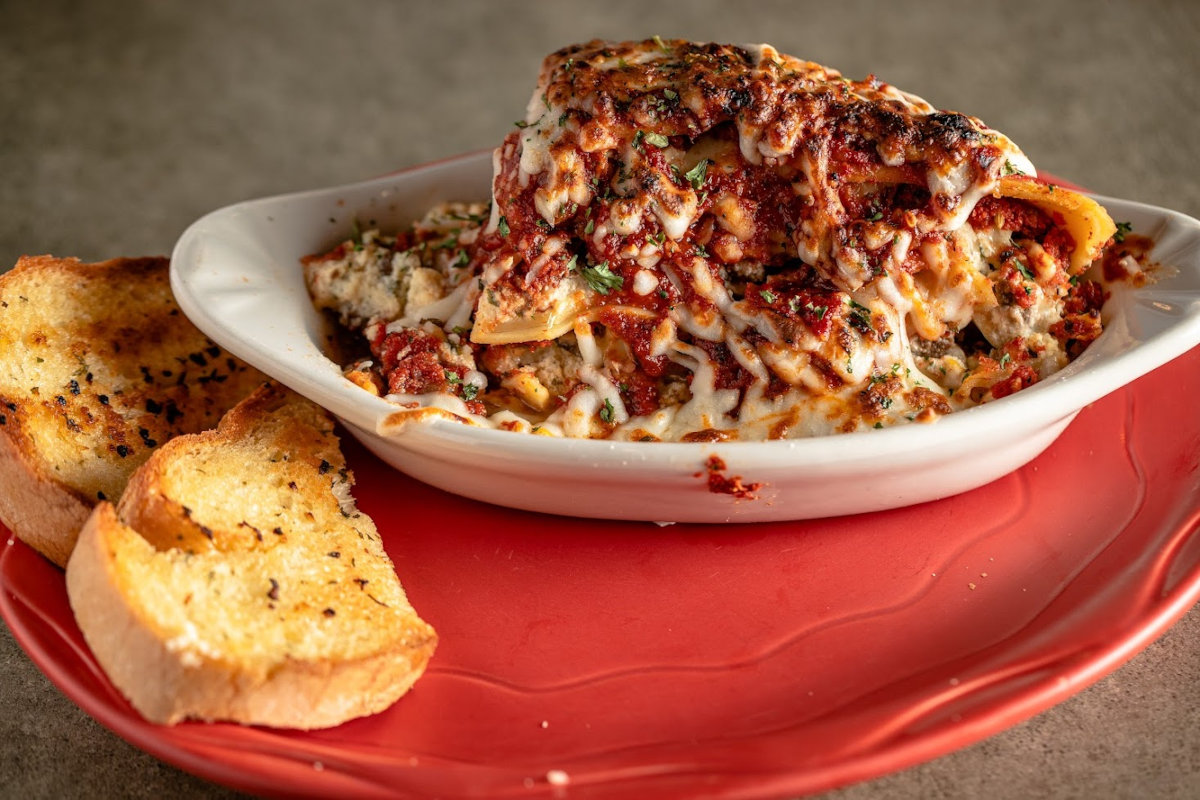 Lasagna with bread on the side
